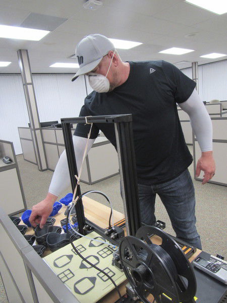 Residents use 3-D printers to make mask sets